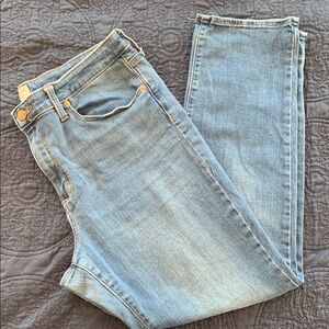 High Rise Slim Straight medium wash jeans